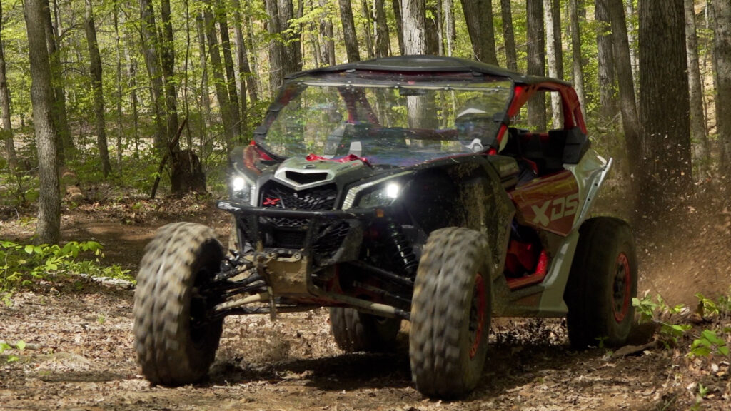 2026 Can-Am Maverick X3 X DS Turbo RR with Smart-Shox driving aggressively on an off-road trail