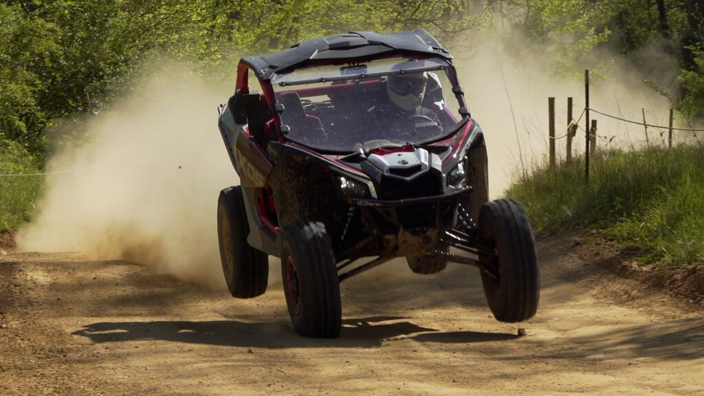 2026 Can-Am Maverick X3 X DS Turbo RR with Smart-Shox suspension working through rough off-road terrain