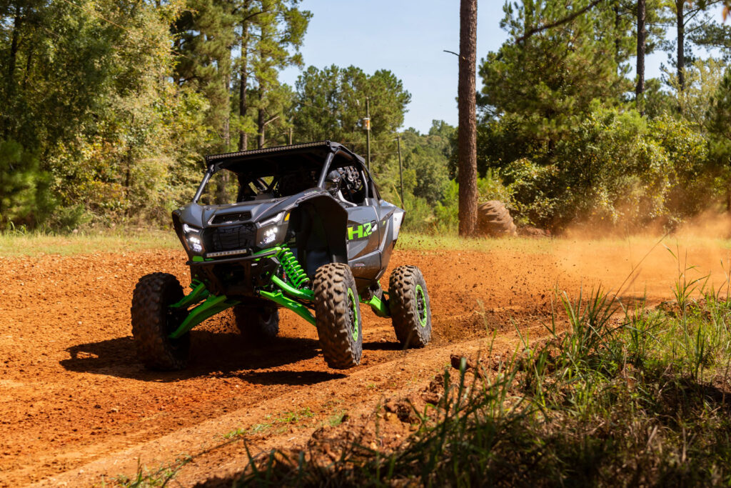 2027 Kawasaki TERYX H2 LIMITED eS sweeping through a high-speed turn during testing.