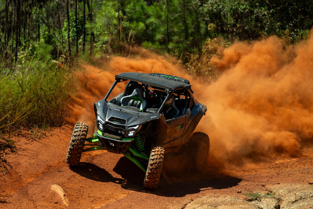 2027 Kawasaki TERYX H2 LIMITED eS accelerating hard out of a turn during testing.