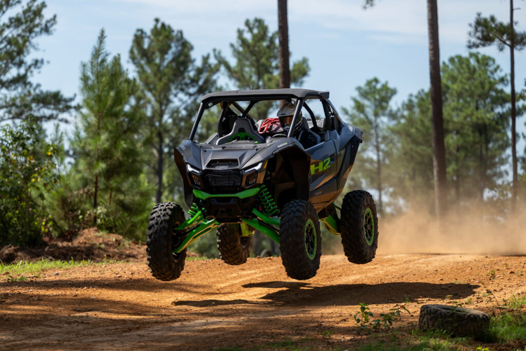 2027 Kawasaki TERYX H2 LIMITED eS jumping on Durhamtown’s Turbo Track during testing.