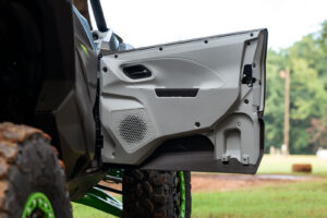 Interior view of the 2027 Kawasaki TERYX H2 LIMITED eS door and inner door handle.
