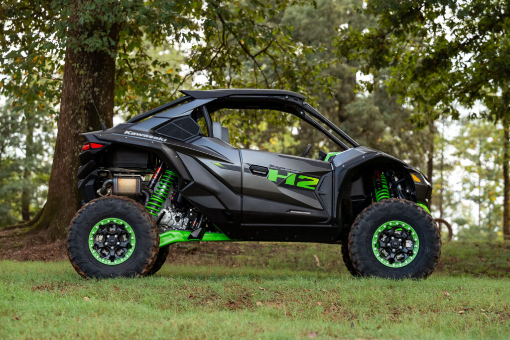 Side profile of the 2027 Kawasaki TERYX H2 LIMITED eS parked during testing.