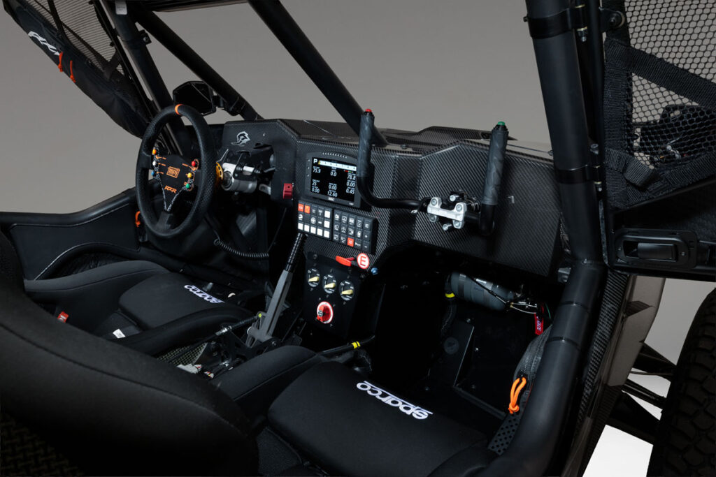 Dashboard and interior controls of the Polaris RZR Pro R Factory Boost race side-by-side.