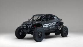 Three-quarter front view of the Polaris RZR Pro R Factory Boost with carbon fiber race bodywork.