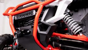 Red HMF HD front bumper with LED light bar and winch on a Honda Talon