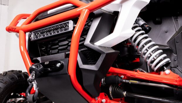 Red HMF HD front bumper with LED light bar and winch on a Honda Talon